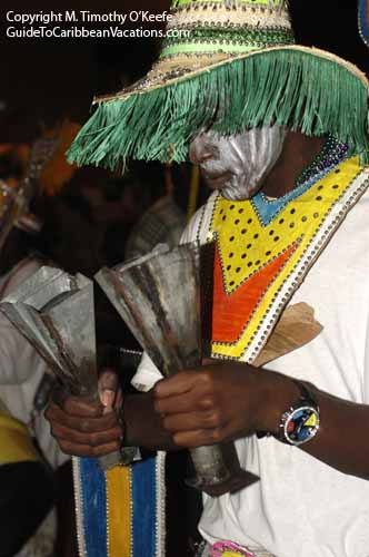 Bahamas Junkanoo Festival Costume Parade Cow Bells copyright M. Timothy O'Keefe - www.GuideToCaribbeanVacations.com